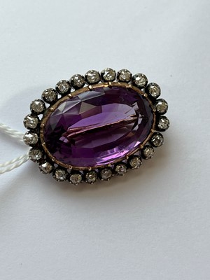 Lot 14 - A late Victorian amethyst and diamond brooch