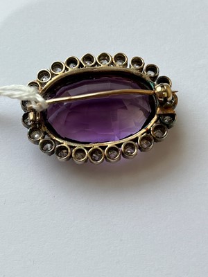 Lot 14 - A late Victorian amethyst and diamond brooch