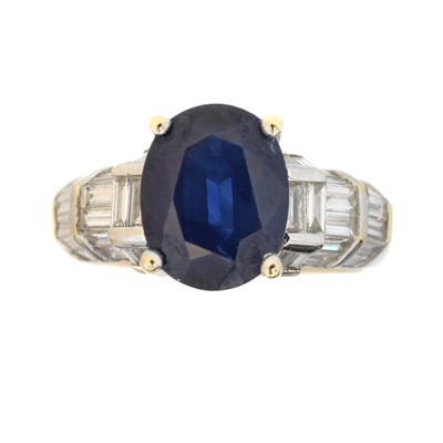 Lot 143 - A sapphire and diamond dress ring