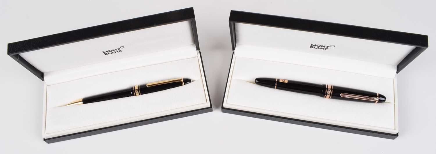 20 - Two Montblanc pens, two Montblanc leather pen pouches and an ink bottle (5).