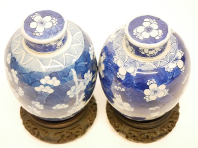 Lot 147 - Two similar Chinese jars and covers