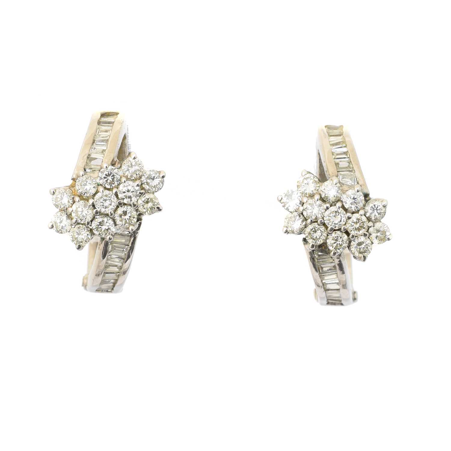 Lot 52 - A pair of diamond hoop earrings