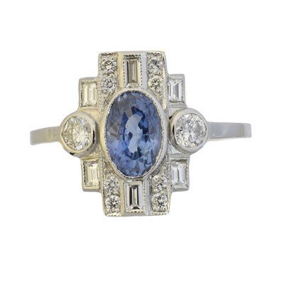 Lot 131 - A sapphire and diamond cluster ring
