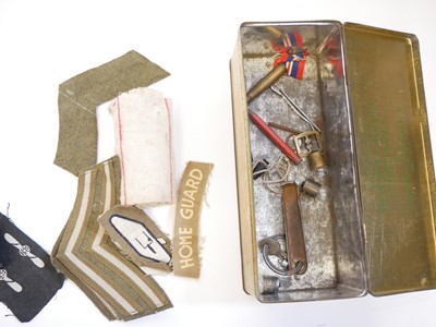 Lot 391 - The Lincolnshire Regiment Cloth helmet fittings and other uniform items