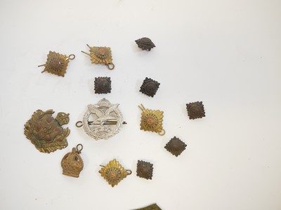 Lot 391 - The Lincolnshire Regiment Cloth helmet fittings and other uniform items