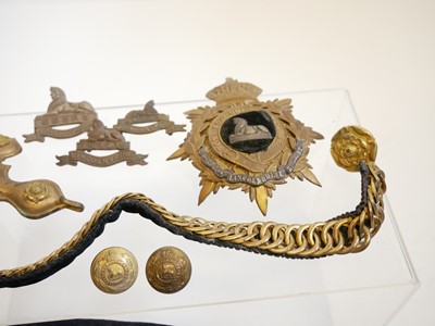Lot 391 - The Lincolnshire Regiment Cloth helmet fittings and other uniform items