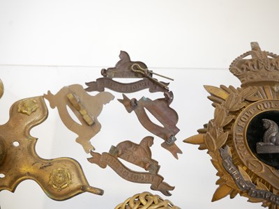 Lot 391 - The Lincolnshire Regiment Cloth helmet fittings and other uniform items