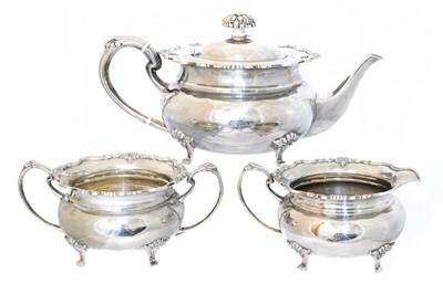 Lot 77 - An Elizabeth II silver three piece tea set