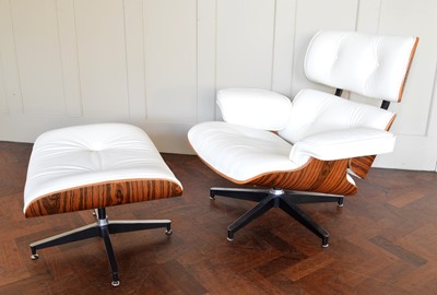 Lot 207 - Modern Eames style armchair & ottoman