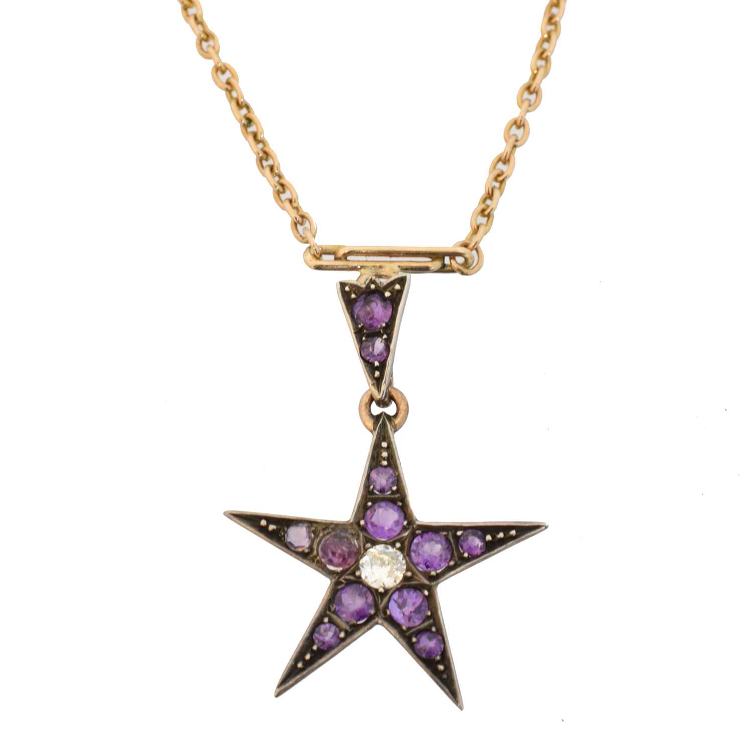 Lot An amethyst and diamond star necklace