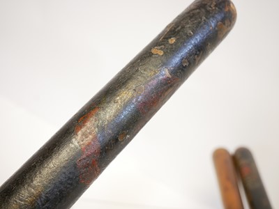 Lot 396 - Four truncheons, and hand cuffs