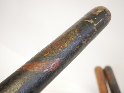 Lot 396 - Four truncheons, and hand cuffs