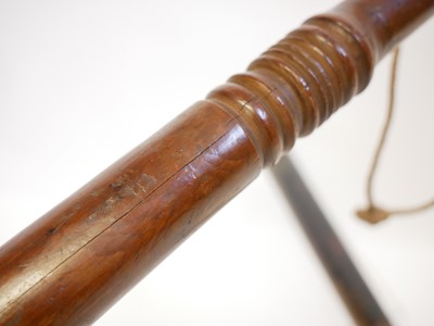 Lot 396 - Four truncheons, and hand cuffs