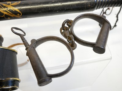 Lot 396 - Four truncheons, and hand cuffs