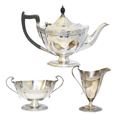 Lot 94 - A George V silver three piece tea set