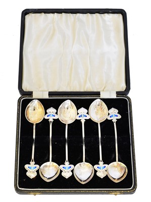 Lot 89 - A set of six 'Liberty style' silver and enamel spoons