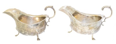 Lot 110 - A pair of George V silver sauce boats