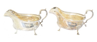 Lot 111 - A pair of George V silver sauce boats