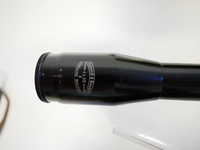 Lot 300 - Schmidt and Bender 4x36 scope and a pair of military binoculars.