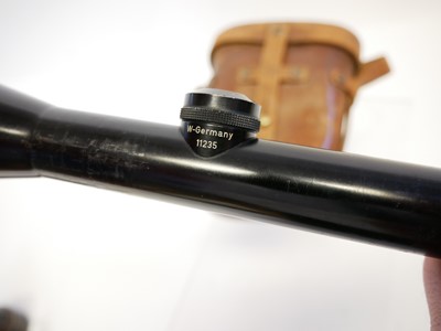 Lot 300 - Schmidt and Bender 4x36 scope and a pair of military binoculars.