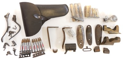 Lot 243 - Collection of rifle parts, castings, oil bottles and a German leather holster