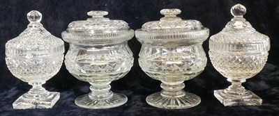Lot 121 - Two pairs of lidded honey pots