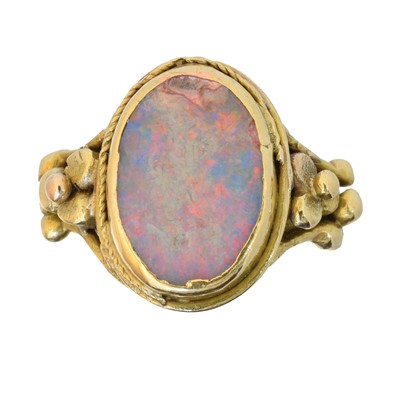Lot 116 - An early 20th century 18ct gold opal dress ring