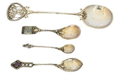 Lot 70 - Four Arts & Crafts white metal spoons