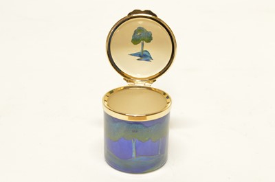Lot 53 - Moorcroft Enamel cylindrical box decorated in Moonlit Blue