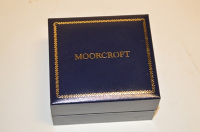 Lot 127 - Moorcroft Enamel oval box decorated in Moonlit Blue