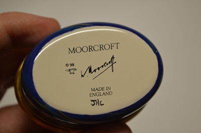 Lot 127 - Moorcroft Enamel oval box decorated in Moonlit Blue