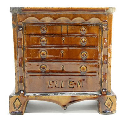 Lot 131 - Treacle glaze chest of drawers money box