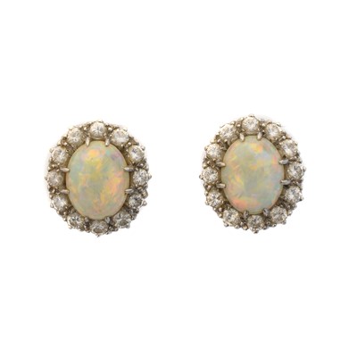 Lot 54 - A pair of opal and diamond earrings