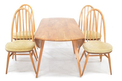 Lot 190 - Ercol elm dining table and four chairs
