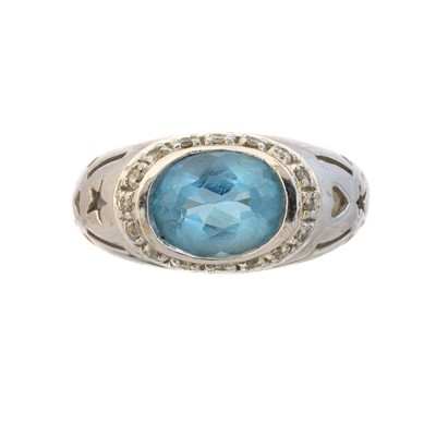 Lot 14 - A 9ct gold blue topaz and diamond dress ring