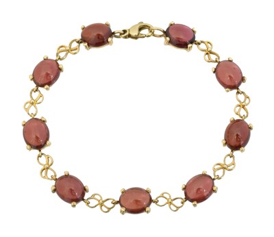 Lot 36 - A 9ct gold garnet bracelet