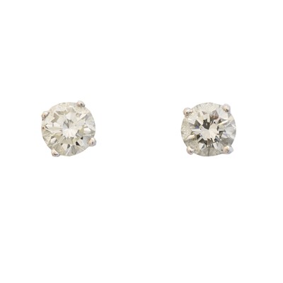 Lot 10 - A pair of brilliant cut diamond stud earrings