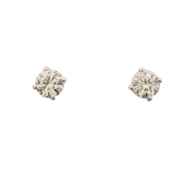 Lot 7 - A pair of brilliant cut diamond stud earrings
