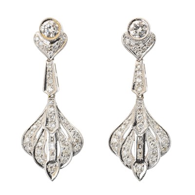 Lot 63 - A pair of diamond drop earrings