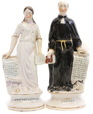 Lot 151 - Pair of Staffordshire figures of Popery and Protestantism