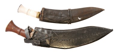 Lot 269 - Two Kukri knives and scabbards