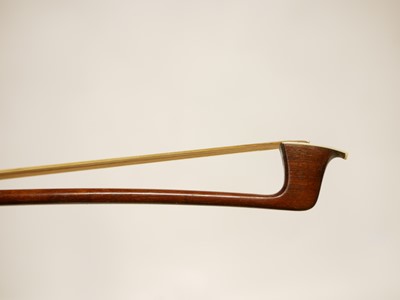 Lot 63 - German silver mounted violin bow