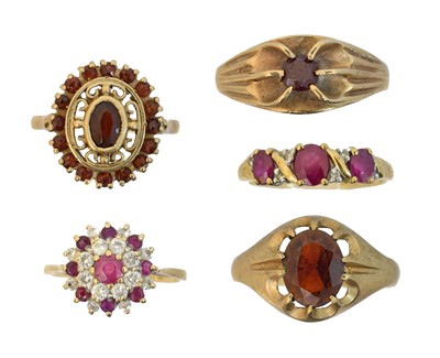 Lot 91 - Five 9ct gold red gem dress rings