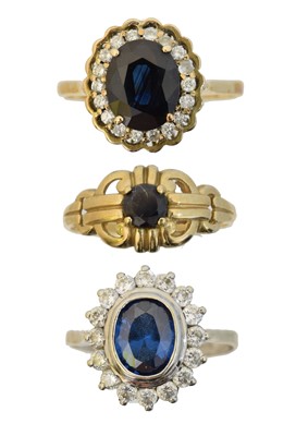 Lot 87 - Three 9ct gold blue gem dress rings