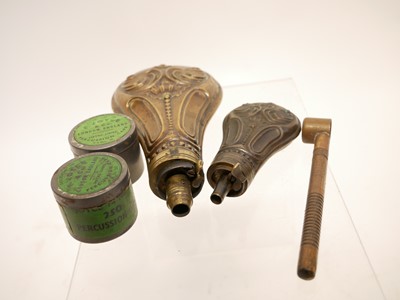 Lot 193 - Two powder flasks, a measure and two Joyce cap tins