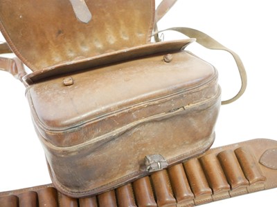 Lot 196 - Good quality leather shotgun belt and cartridge bag, also a shooting stick.