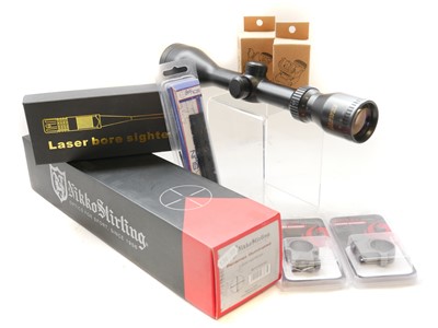 Lot 250 - Boxed Nikko Stirling scope, also another scope and other optics accessories.