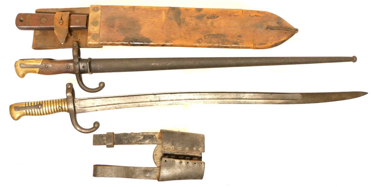 Lot 448 - Gras bayonet and scabbard, Chassepot bayonet and a Machette and sheath