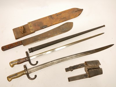 Lot 448 - Gras bayonet and scabbard, Chassepot bayonet and a Machette and sheath