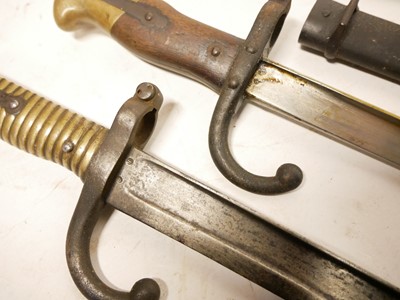 Lot 448 - Gras bayonet and scabbard, Chassepot bayonet and a Machette and sheath